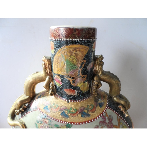 147 - Asian 20thC extensively decorated flask vase,

48 cm tall