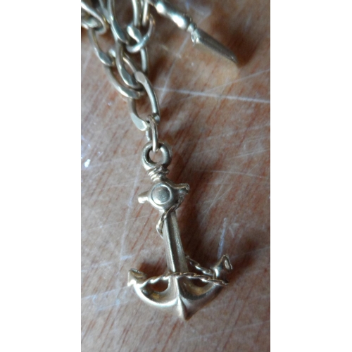 46 - Ladies 9ct yellow gold charm bracelet with approx 22 gold charms, some stamped, some unmarked,

23.7... 