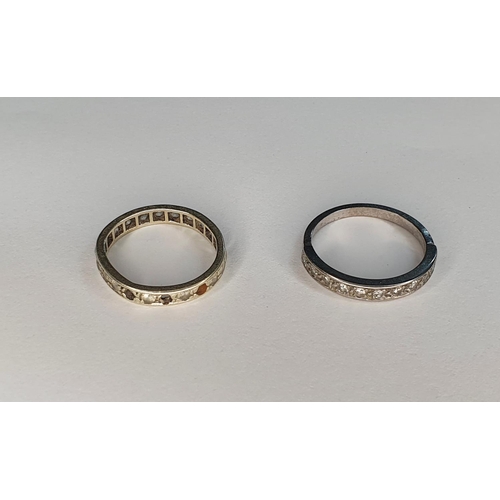 59 - Two unmarked (untested) white metal, eternity & half eternity rings in original old ring boxes (2)