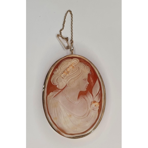 61 - Large oval Edwardian cameo brooch in gold setting,

Please note - the gold stamp is indistinct