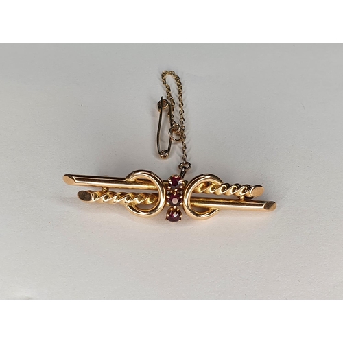 65 - Fine quality antique 15ct yellow gold and ruby brooch,

3.1 grams gross