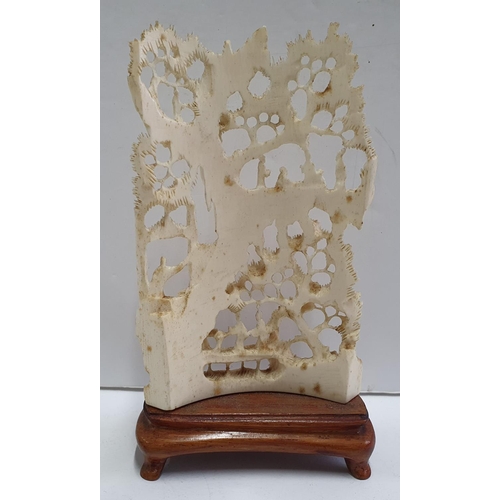 156 - Fine carved, antique Ivory Japanese figures in landscape scene on wooden plinth