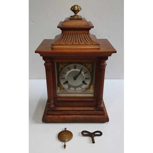113 - Fine quality antique hardwood mantle clock compete with pendulam and keys