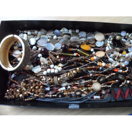 49 - Two trays of good quality costume jewellery including a large quantity of colourful ladies bead neck... 