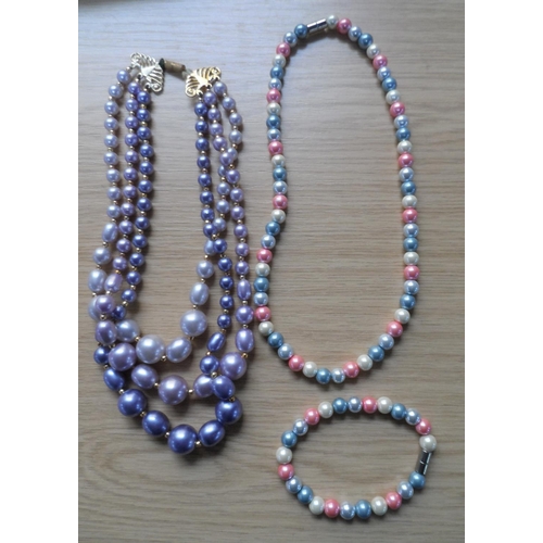 49 - Two trays of good quality costume jewellery including a large quantity of colourful ladies bead neck... 