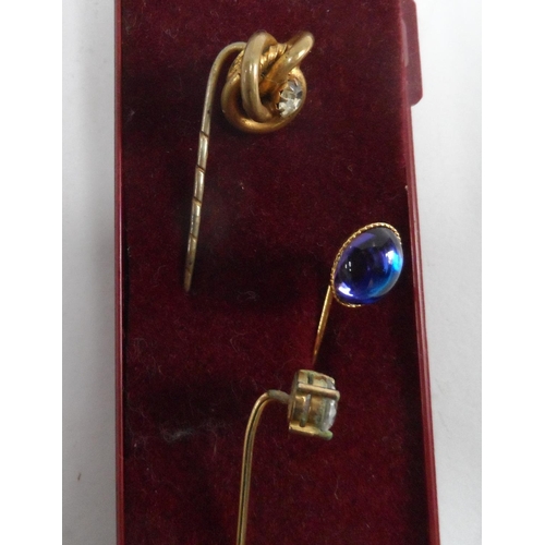79 - Six antique stick pins including three silver examples (6)