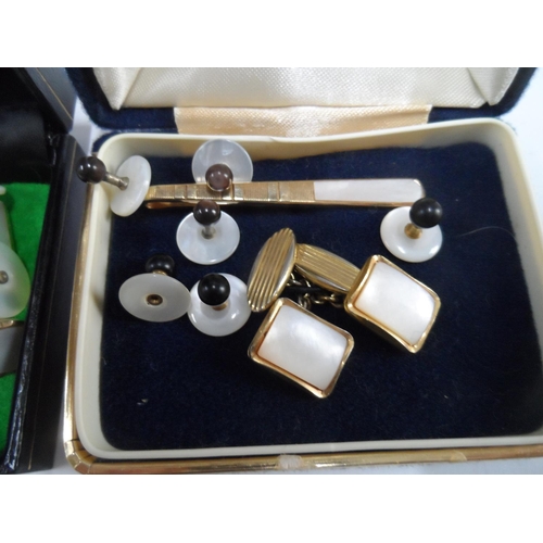 38 - Two small boxes full of vintage cuff-links including mother of pearl examples (Qty)
