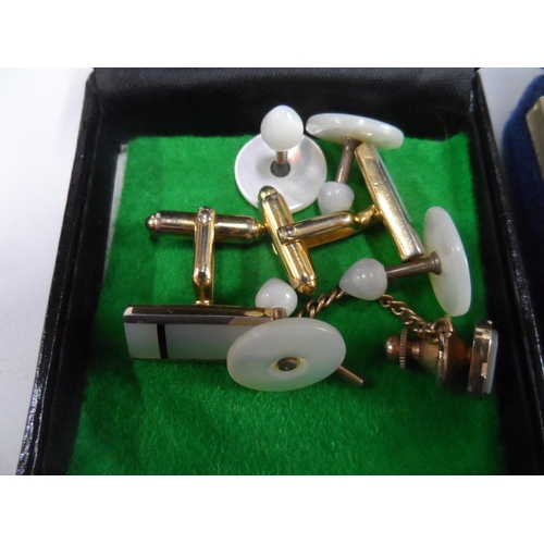 38 - Two small boxes full of vintage cuff-links including mother of pearl examples (Qty)