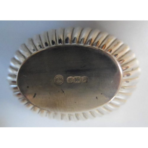 27 - Late 20thC Sheffield silver cruet set,

175 grams of silver