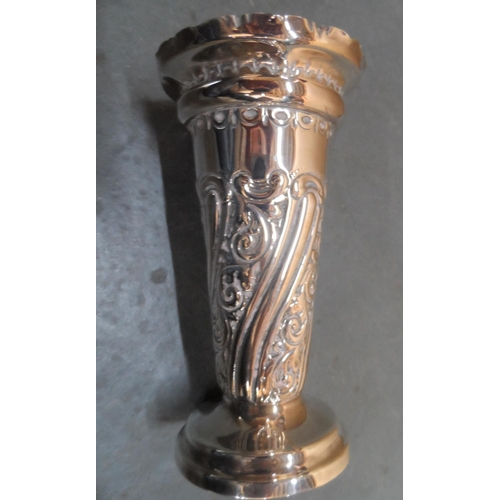 32 - Wide bodied antique silver bud vase with weighted base,

14 cm tall                  Marks partially... 