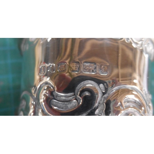 32 - Wide bodied antique silver bud vase with weighted base,

14 cm tall                  Marks partially... 