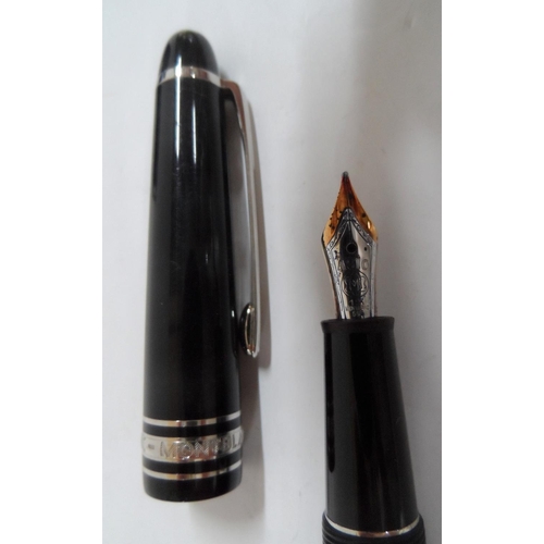173 - Mont Blanc 14ct gold nibbed fountain pen together with a Mont Blanc bottle of ink (2)