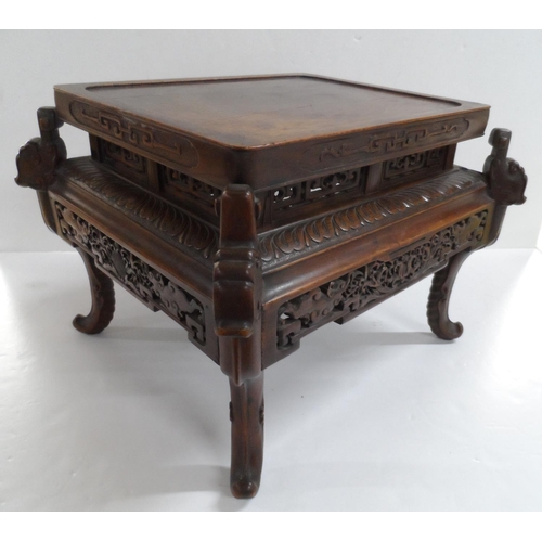 144 - Chinese extensively carved hardwood stand, circa 1900,

36 x 30 cm by 27cm high