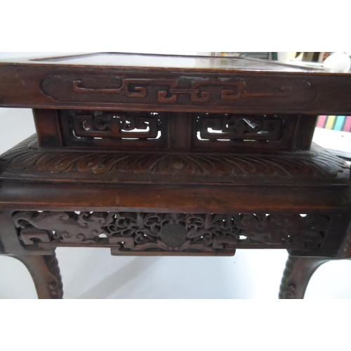 144 - Chinese extensively carved hardwood stand, circa 1900,

36 x 30 cm by 27cm high