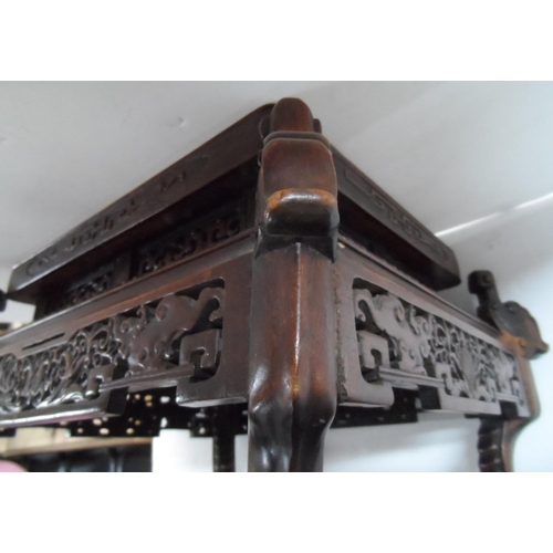 144 - Chinese extensively carved hardwood stand, circa 1900,

36 x 30 cm by 27cm high