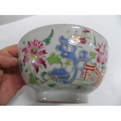 158 - Three old Oriental, unmarked bowls including a finely decorated floral example (3)