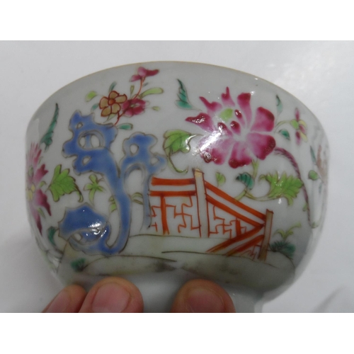 158 - Three old Oriental, unmarked bowls including a finely decorated floral example (3)