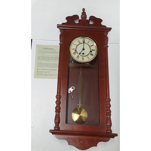 116 - German 20thC wall hanging clock with pendulum and key