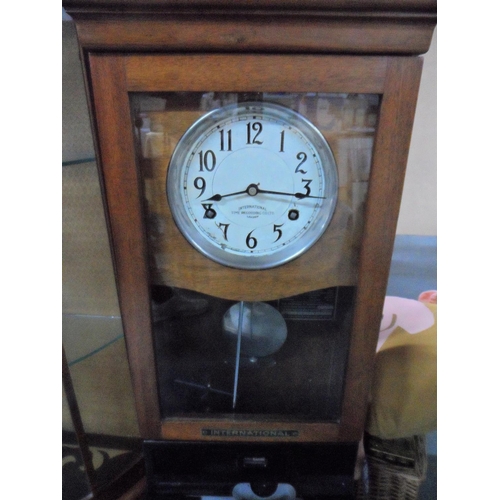 125 - Edwardian clocking In machine by the International Time Recording Co,

Approx 1 m high