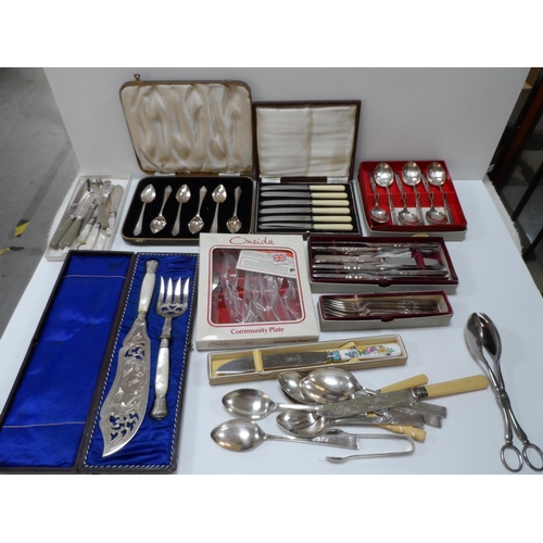 88 - Large quantity of cased and uncased flatware including a cased pair of antique fish servers with mot... 
