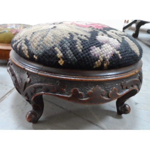 85 - Three Victorian circular footrests together with a fine quality inlaid antique book rest (4)
