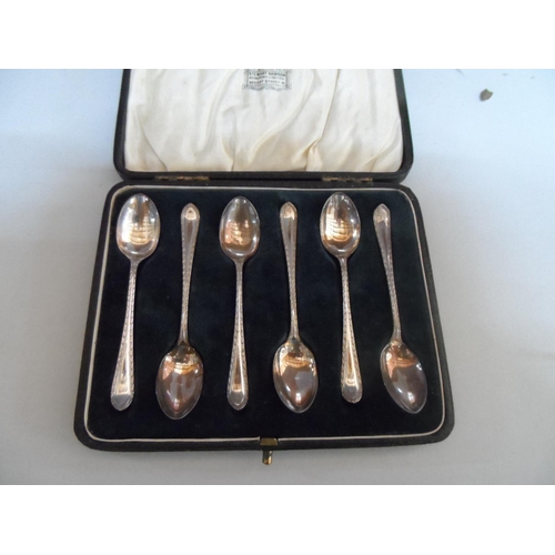 4 - Cased set of Sheffield 1937 silver spoons,

45 grams