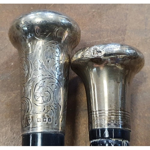 56 - A well presented silver tipped swagger stick and a silver topped cane, (2)