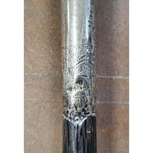 55 - Large antique silver topped ebonised wood cane