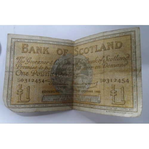 65 - Old money box containing a 1954 £1 bank of Scotland note together with British and world coins inclu... 