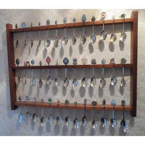 114 - Large collection of commemorative spoons together with 2 wooden spoon wall hangers (Qty)