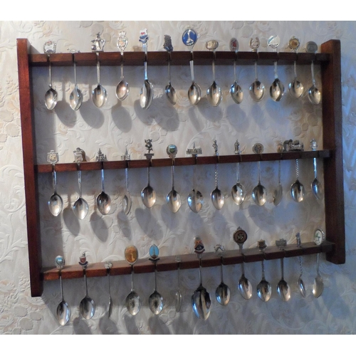 114 - Large collection of commemorative spoons together with 2 wooden spoon wall hangers (Qty)