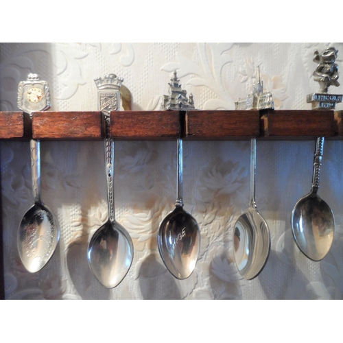 114 - Large collection of commemorative spoons together with 2 wooden spoon wall hangers (Qty)