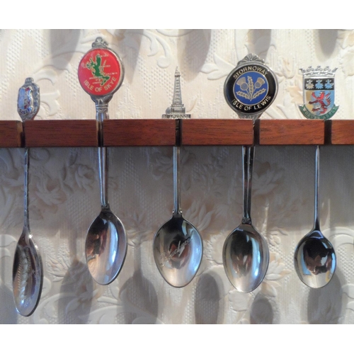 114 - Large collection of commemorative spoons together with 2 wooden spoon wall hangers (Qty)