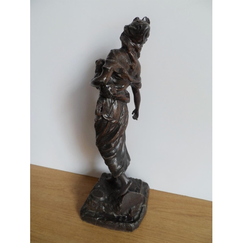163 - Antique bronzed continental school stature of lady holding a lamb