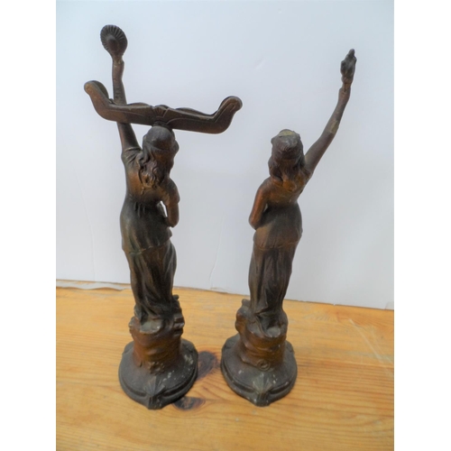 164 - Pair of early 20thC cast metal figurines (2),

Both figures measure approx 32 cm tall
