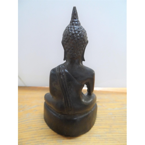 165 - Antique small bronze Buddha,

12 cm tall              250 grams