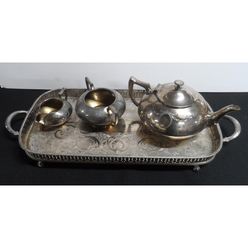 111 - Fine quality 20thC engraved oval tray together with a 3 part plated tea service (4)