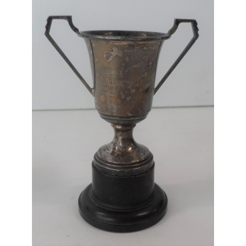 3 - Small, mid 20thC silver trophy on ebonised wooden plinth