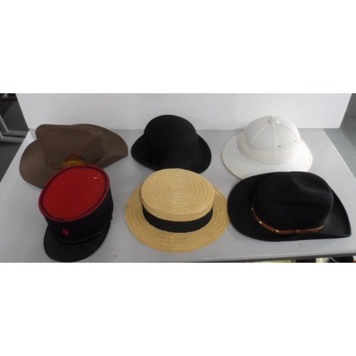 47 - Good collection of hats to include a Bowler by Dunn & Co, French Kepi, a Pith, straw boater etc (6)