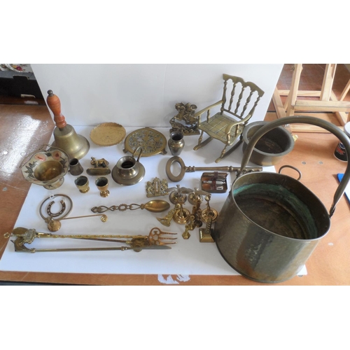 78 - Large quantity of good quality old brassware to include and old school bell, jam pan and over-sized ... 