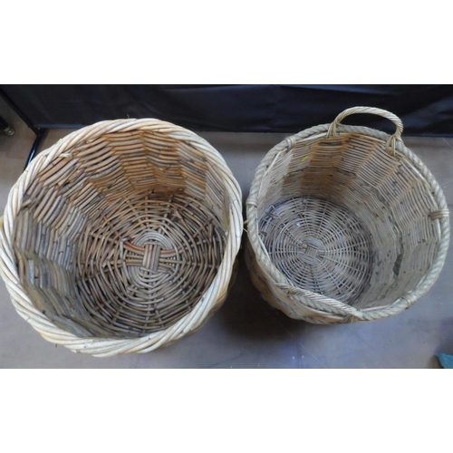 348 - Two over-sized large wicker log storage baskets (2)