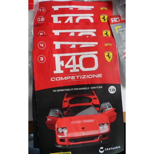 92 - Ferrari F40 Competizone model car parts with magazines