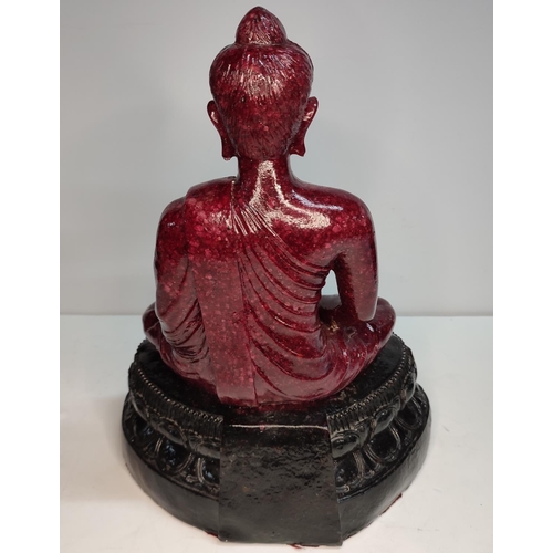 34 - Extremely rare, large, Ruby-Zoisite carved seated Buddha sat on associated black Tschermakite, 

40 ... 