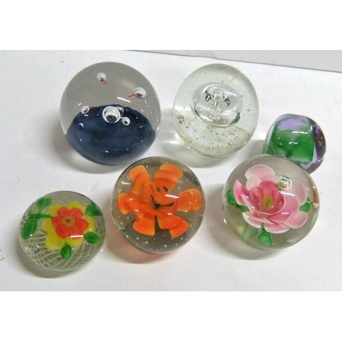 525 - 6 Glass paperweights