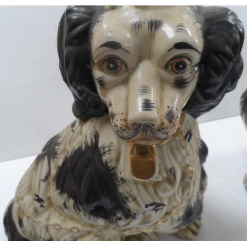 531 - Two over-sized Victorian Staffordshire dogs (2)