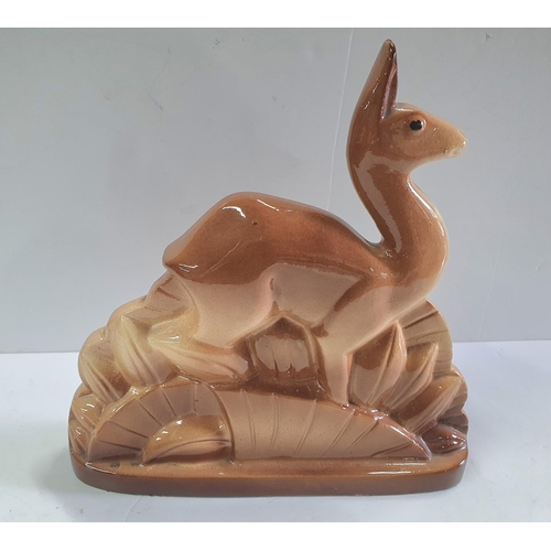 505 - Unmarked, Continental school, Art Deco ceramic Fawn,

25 cm long