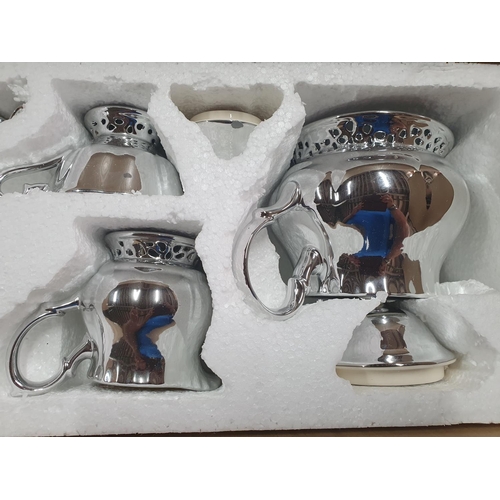 150 - Boxed plated tea service