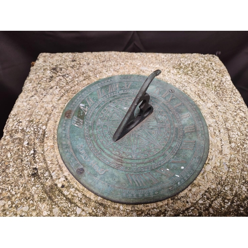 606 - A stone sundial with removable top