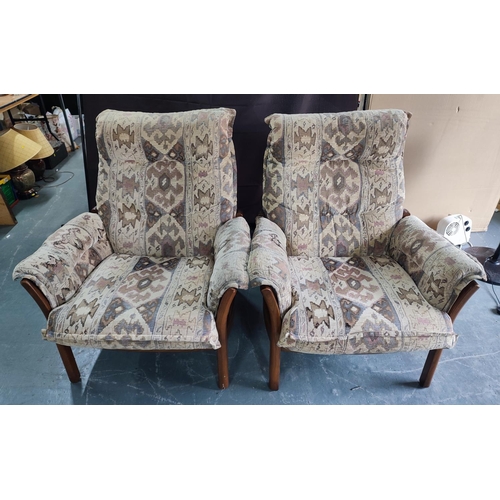 903 - A pair of Ercol lounge chairs (2)