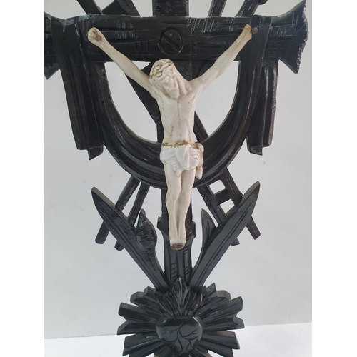 291 - Late 19thc French hand-carved, ebonised wooden Christ on cross,

48 cm tall